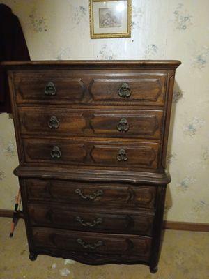 It's 6ft tall and a little longer than 4 ft wide. Its real hardwood and theres a spot to hold your jewelry in the top dresser