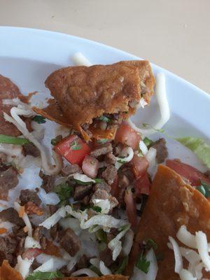 Greasy burnt taco shells..