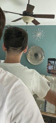 Another angle of a custom design haircut