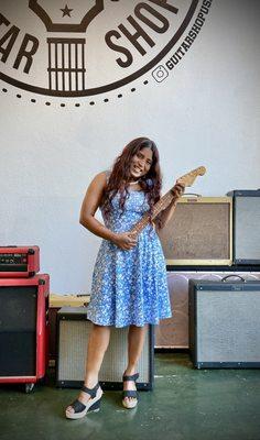 Ronnie rocking out in Chris's guitar while waiting for a re-string.