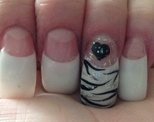 I love long nails. They do nice designs. I do go a little over board some times.