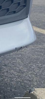 Harassment and fraudulent claims of car damage by Hertz. As you can see they're plastic bumper cover has been painted many times.