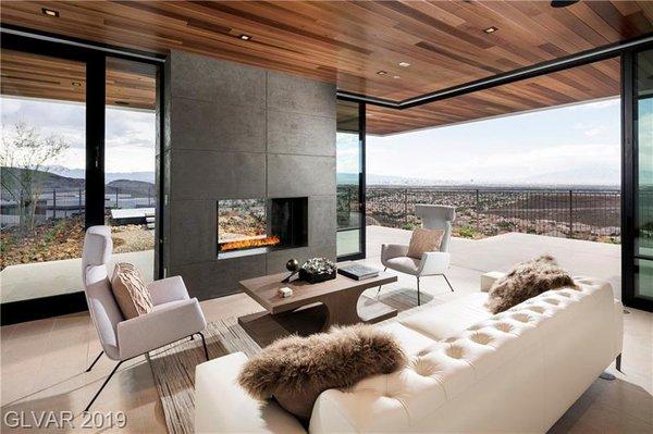 Cozy fireplace overlooking the Las Vegas views. Schedule to see!