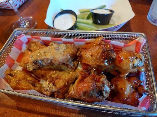 Large wings (14), sweet chili tehi (right) & buttery garlic Parmesan