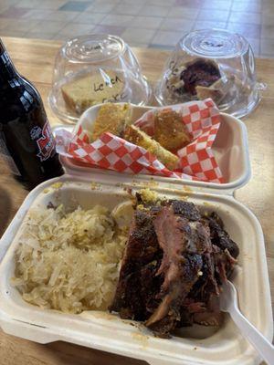 Pork ribs, corn bread , sauerkraut, lemon cake, and cherry tart.