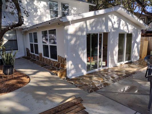 Here we built the Sun Room and created some Masonry around the building as requested from the client.