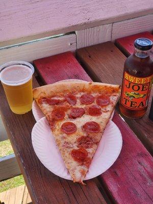 A slice of pepperoni washed down with a Flounder Pounder and Joe's Tea.