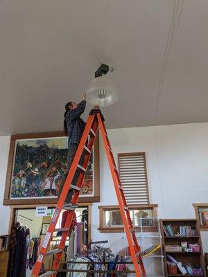 Putting up the new LED's Whoot! We save money, you save money...