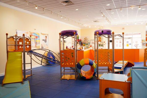 Proprietary play equipment changes every three weeks to provide new challenges and themes for Play Classes.
 Photo: LaLa Photography DFW