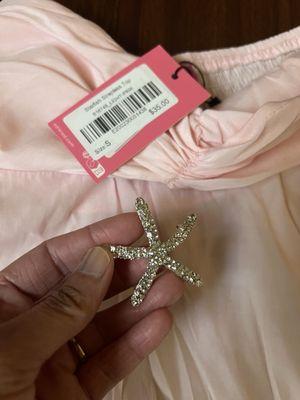 Shirt with broken pin