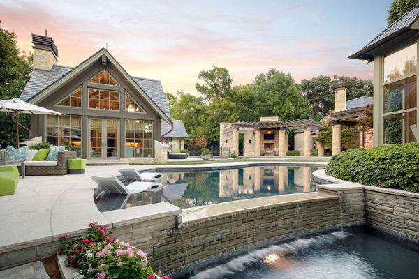 The existing pool was removed and redesigned to better fit the overall look we were trying to achieve.