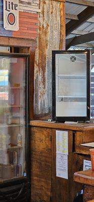 Where you'd expect to find cold water bottles. Instead just empty racks and an offer if "i have coke instead..."