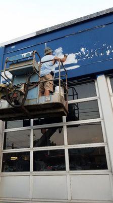 Early stages of the new paint for the front of the shop.