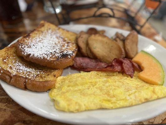 French toast, eggs (omelette) Turkey bacon, potato