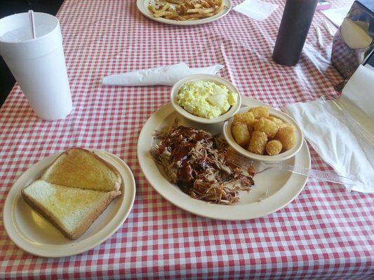 BBQ pork with tator tots and potato saled