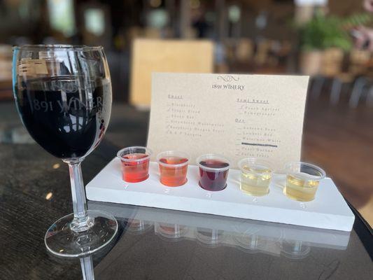 Glass of Lambert Red and a wine flight.