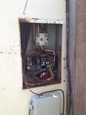 Old rusted main meter panel