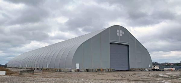 A 120' wide x 400' long fabric building from  Alaska Structures used for environmental remediation, coal ash removal project.