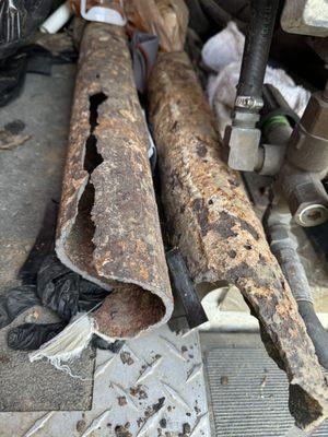 Old broken cast iron drain piping.