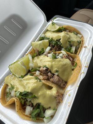 Carnitas tacos with green sauce