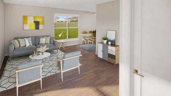 A living room with a couch and a table