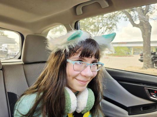 A picture of my niece with the side of the glasses which was repaired!