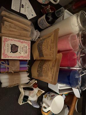Palo Santo, soap & Florida Water made by the shop, lavender & mugwort, tiny candles, crystals (rose quartz, black obsidian, blue lace agate)