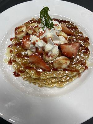 Strawberry Banana Pancake Fresh strawberries, bananas, whipped cream & that Toast It Iz drizzle.
