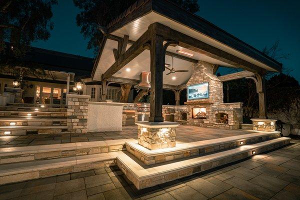From the ground up overhead patio cover with firepit/ bbq grill and wall mounted TV