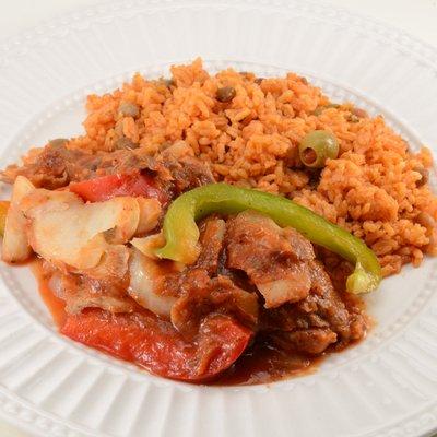 Bacalao Guisado Y Arroz con Gandules -
Cod Fish Stew with Rice and Pigeon Peas
