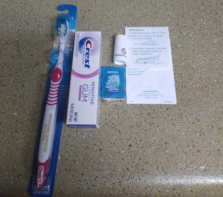 Goodie bag includes, Toothbrush, toothpaste, floss. I asked for the Threaders and Lip Balm.