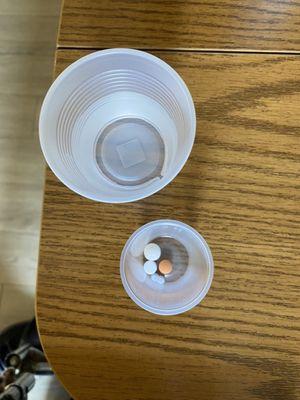 Pills left out by the traveling nurse not given at morning time and they wondered why he was still in bed and then gave pills at 1130am