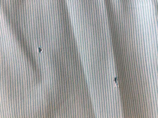 Nothing like a couple of fresh, clean puncture holes to brand the shirt with the Concord service.