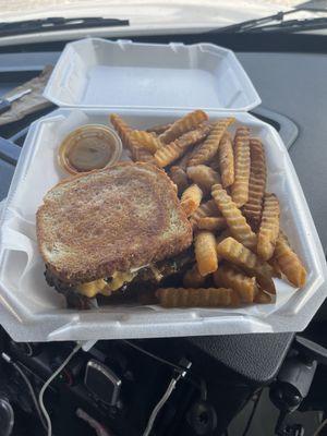 Double smash w/ brisket on Texas toast and fries.