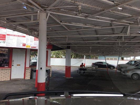 Tables in case you don't want to eat in your car or take it to go.