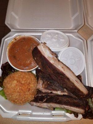BBQ rib basket BBQ baked beans potato salad steak and chicken rice ball