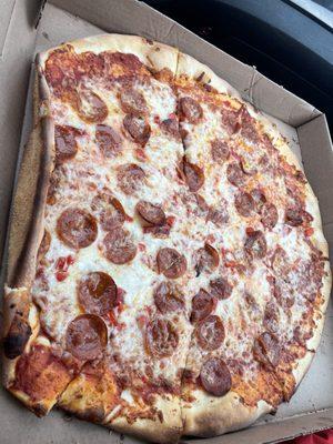 Large pepperoni and peppers. Toppings in good balance, love the oregano heavy sauce