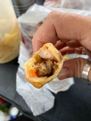 Inside of the fried shrimp spring rolls. House-made. Very good. Has mushroom, cabbage and carrots inside.