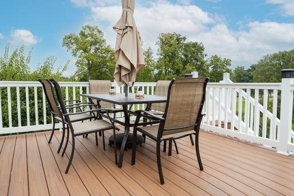 Hazelnut Veka Decking with white vinyl railing.
