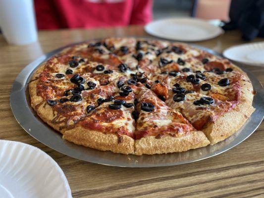 Large pepperoni, olive, and cheese pizza