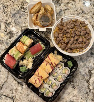 Rainbow Roll, Tuna Sashimi (1pc.), Covington Roll, California Roll, Pork Gyoza, Steak and Noodles Bowl