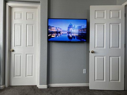 Articulated mount on 43in LG UHD (UN7300 AUD; hidden wires/plug) in master bedroom