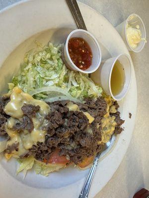 Bomber salad with beef.