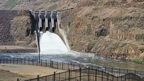 Water spilling from nearby Brownlee Dam.