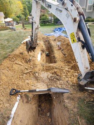 (Before) Downspout Installation, 60 feet of French Drain and (2) area Drains tied into City Storm in Montgomery Oh, Under Sidewalks! Wow!!!!