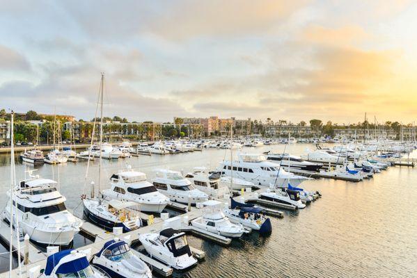 Boats in docks at Marina Harbor Anchorage during sunset