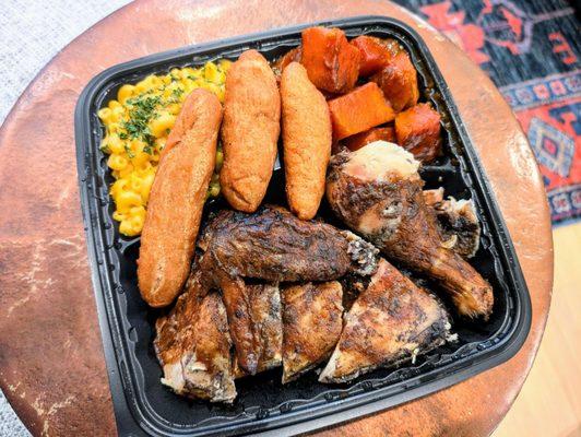 1/2 Jerk Chicken, yams, Mac, and festival