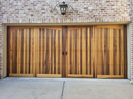 Wood garage door with decoration