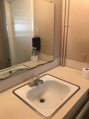 Look at the mirror and sink