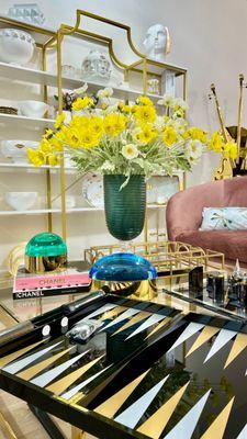 Luxury home decor with bold florals, elegant ceramics, and stylish accent pieces